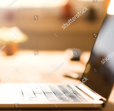 Stock Photo Informal Workplace At Home With Laptop And Phone On Wooden Table In Front Of The Window 534489181 1